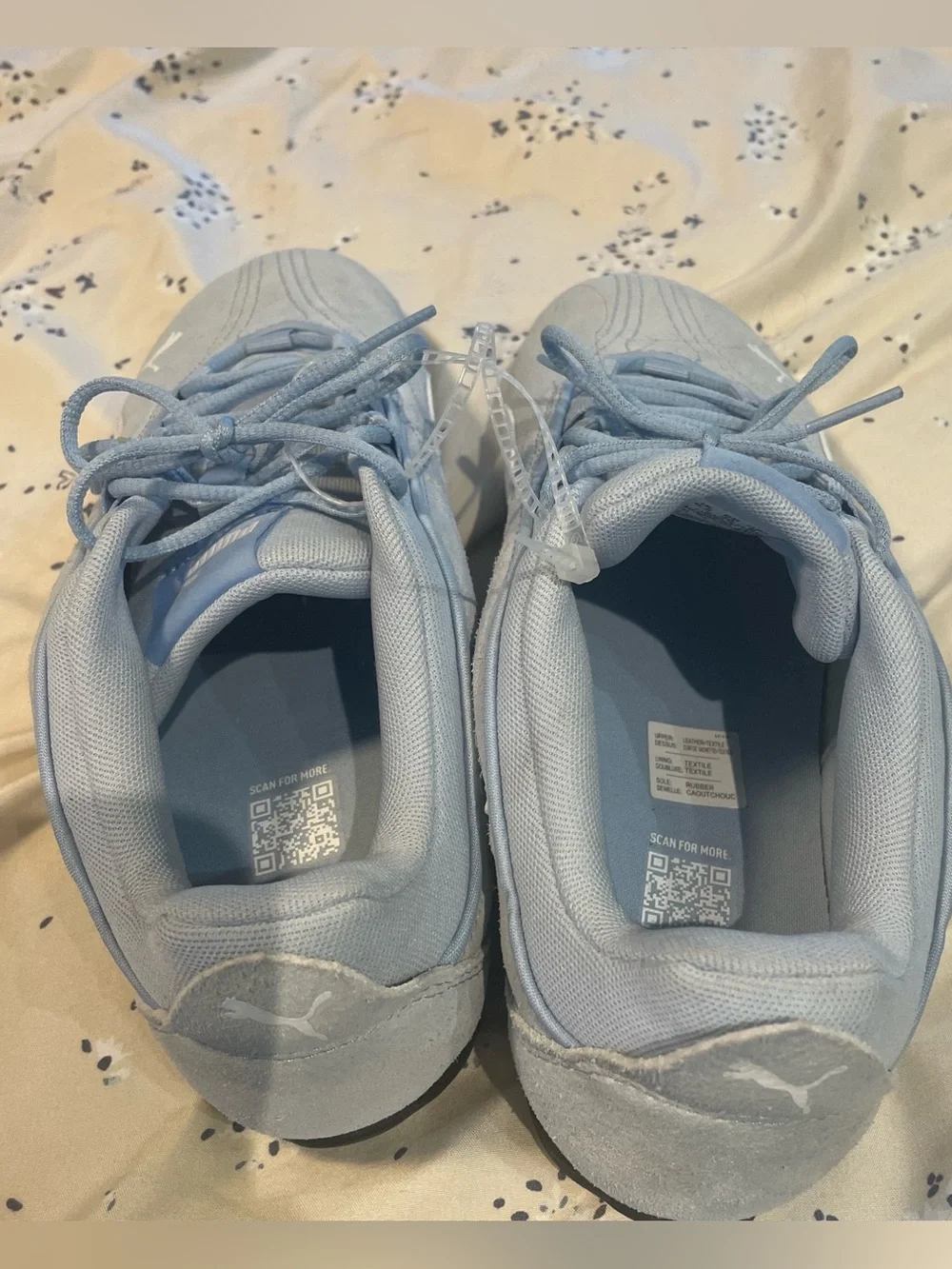 Puma light blue tennis shoes